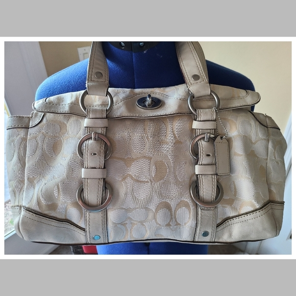 cream color coach purse